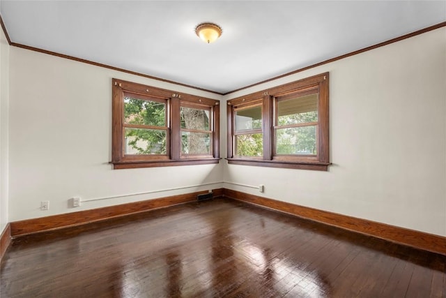 210 16th St SE, Cedar Rapids, IA 52403 - unfurnished room featuring crown molding and dark wood-style flooring