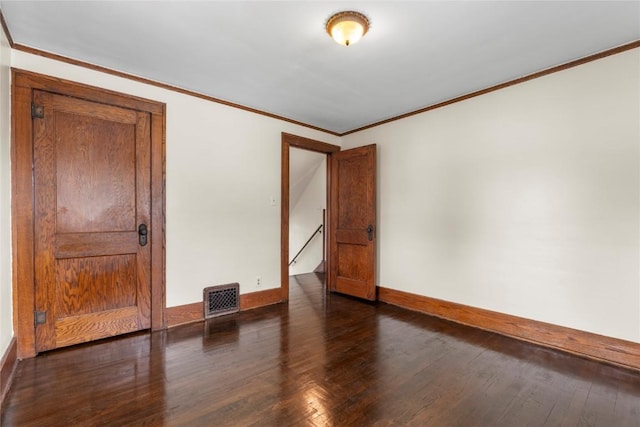 210 16th St SE, Cedar Rapids, IA 52403 - unfurnished room featuring ornamental molding and dark wood finished floors