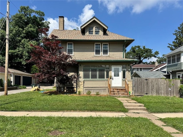 383 21st St SE, Cedar Rapids, IA 52403 - traditional style home with a chimney, entry steps, roof with shingles, and a garage