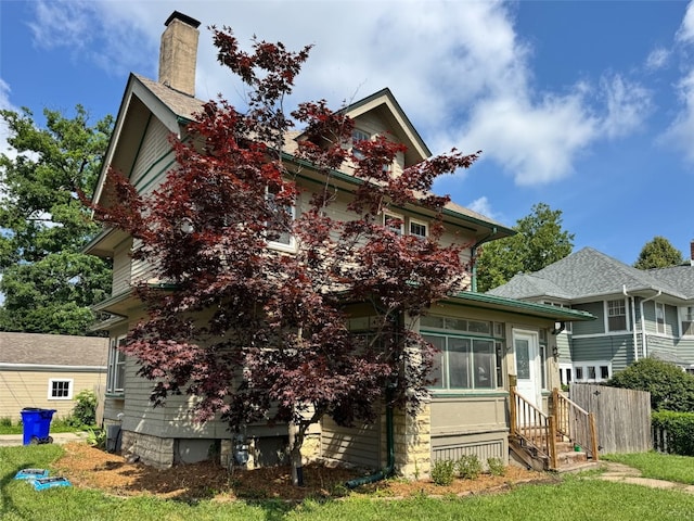 383 21st St SE, Cedar Rapids, IA 52403 - view of front of house featuring a chimney
