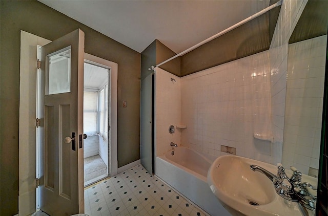 383 21st St SE, Cedar Rapids, IA 52403 - bathroom featuring shower / tub combination and tile patterned floors