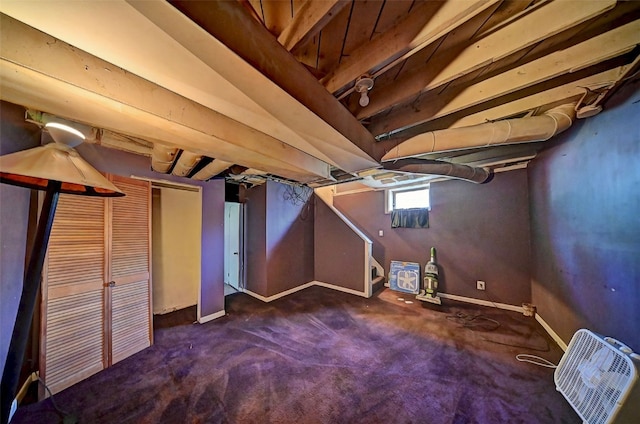 383 21st St SE, Cedar Rapids, IA 52403 - below grade area featuring carpet flooring and stairs