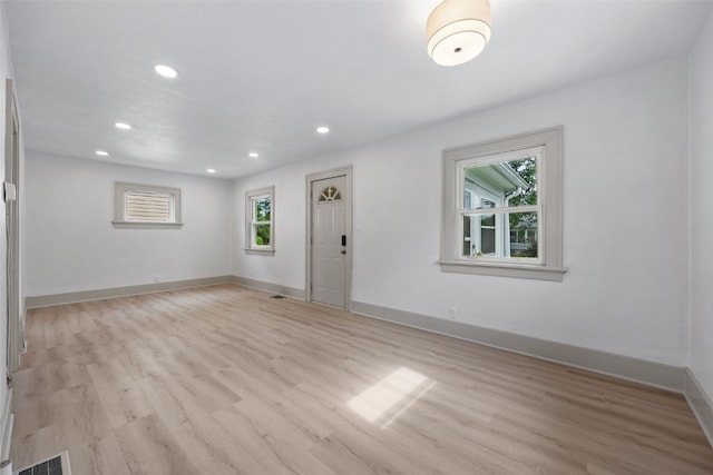 609 34th St NE, Cedar Rapids, IA 52402 - entryway with light wood-style flooring and recessed lighting