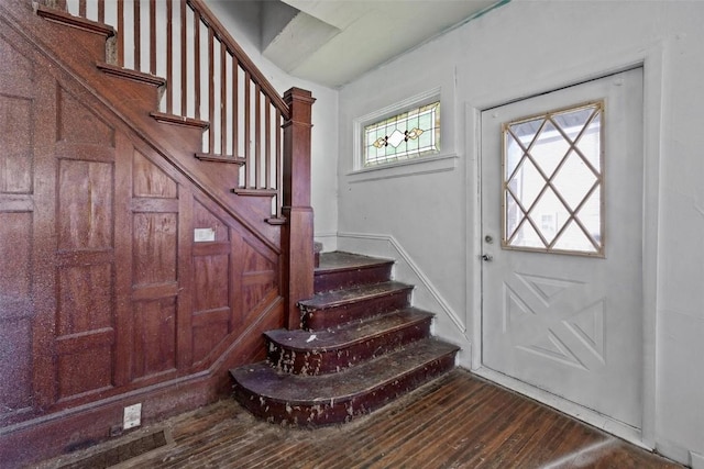 205 E Main St, Lisbon, IA 52253 - foyer with stairway and dark wood-style flooring