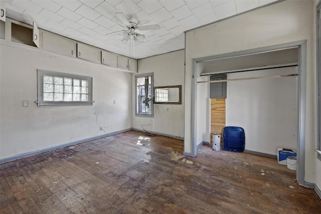 205 E Main St, Lisbon, IA 52253 - unfurnished bedroom featuring hardwood / wood-style floors and a closet