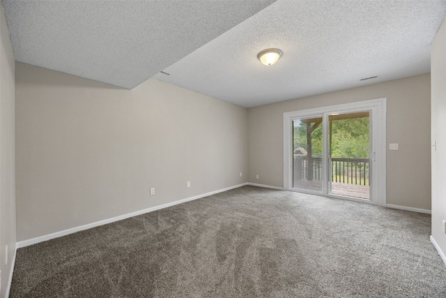 265 Parkview Ct, North Liberty, IA 52317 - carpeted empty room with a textured ceiling