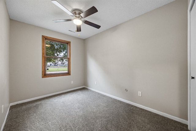 265 Parkview Ct, North Liberty, IA 52317 - spare room featuring carpet flooring, a ceiling fan, and a textured ceiling