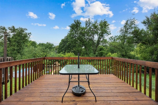 265 Parkview Ct, North Liberty, IA 52317 - wooden deck featuring outdoor dining space