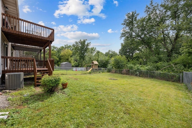 265 Parkview Ct, North Liberty, IA 52317 - fenced backyard with a playground and a wooden deck