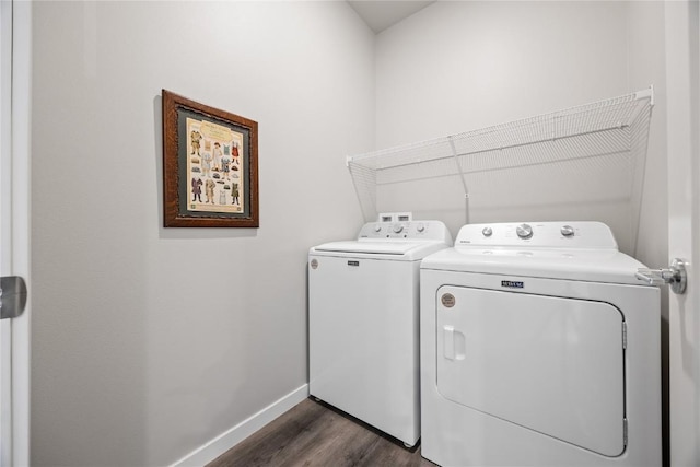 780 Brook Ridge Ave, North Liberty, IA 52317 - laundry room with washing machine and dryer and dark wood-type flooring