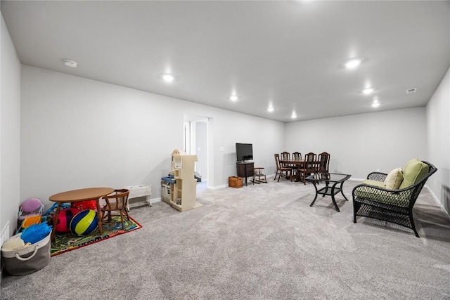 780 Brook Ridge Ave, North Liberty, IA 52317 - living area with carpet and recessed lighting