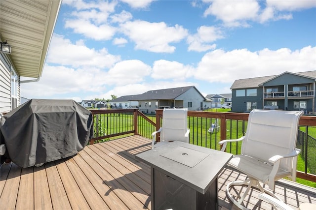 780 Brook Ridge Ave, North Liberty, IA 52317 - wooden deck with a residential view, a yard, and grilling area