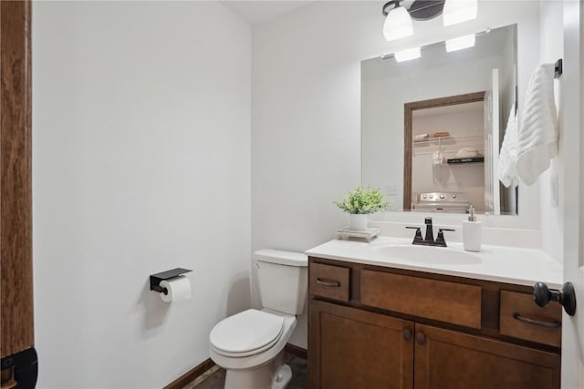 2903 Belle St SW, Cedar Rapids, IA 52404 - bathroom featuring vanity and toilet