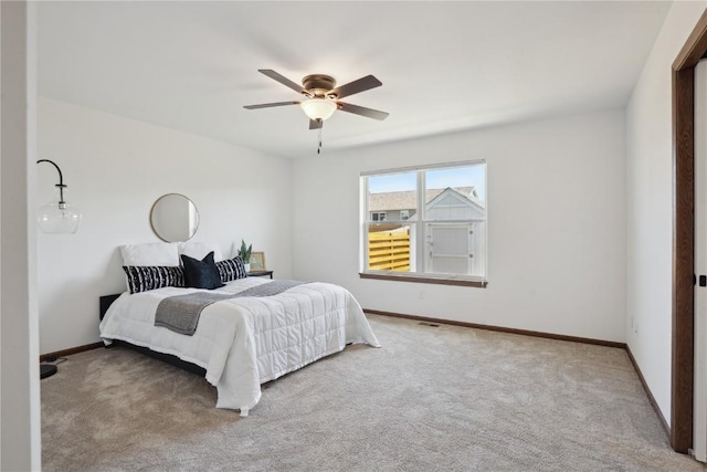 2903 Belle St SW, Cedar Rapids, IA 52404 - bedroom with carpet and ceiling fan
