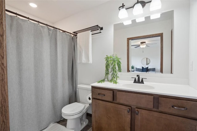 2903 Belle St SW, Cedar Rapids, IA 52404 - full bathroom with vanity, ceiling fan, and curtained shower