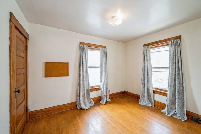 1022 19th St SE, Cedar Rapids, IA 52403 - unfurnished room featuring light wood finished floors and baseboards