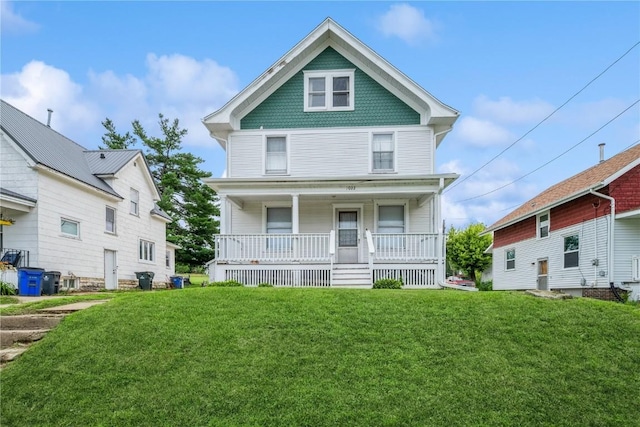 1022 19th St SE, Cedar Rapids, IA 52403 - view of front of home with covered porch and a front lawn