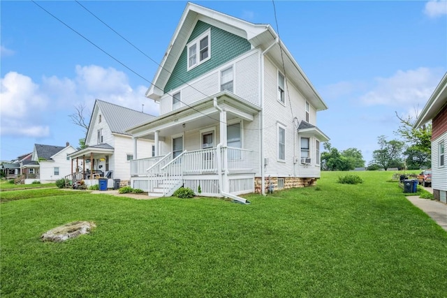 1022 19th St SE, Cedar Rapids, IA 52403 - view of front of home featuring a porch and a front lawn