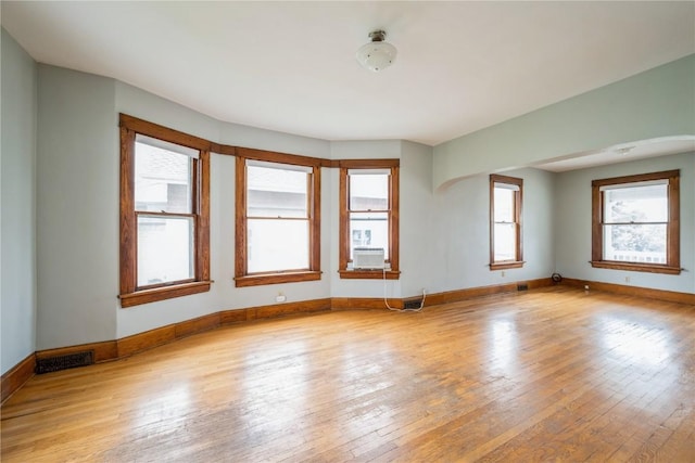 1022 19th St SE, Cedar Rapids, IA 52403 - spare room with hardwood / wood-style floors and cooling unit