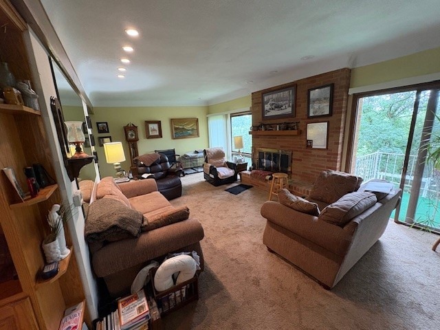 2119 Lakeview Ridge Dr NE, Solon, IA 52333 - living area with carpet and a fireplace