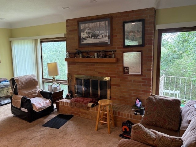 2119 Lakeview Ridge Dr NE, Solon, IA 52333 - living area featuring carpet floors and a brick fireplace