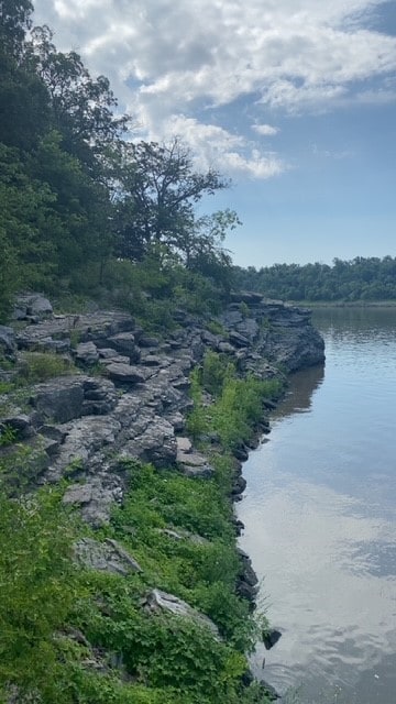 2119 Lakeview Ridge Dr NE, Solon, IA 52333 - water view featuring a heavily wooded area