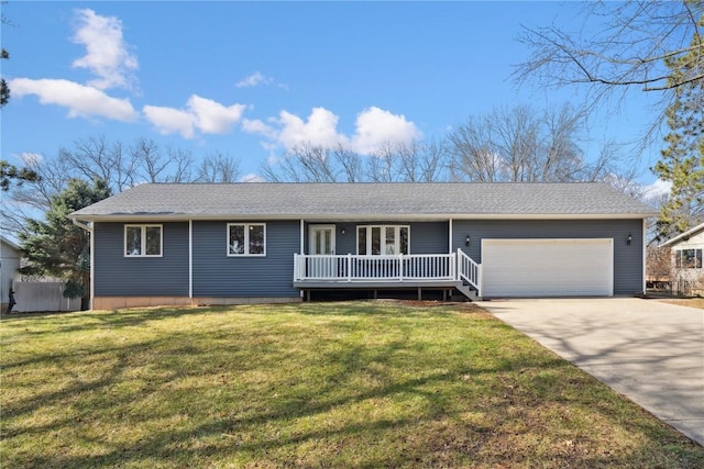 2135 Lake View Ridge Dr NE, Solon, IA 52333 - ranch-style home with an attached garage, a front yard, concrete driveway, and a shingled roof
