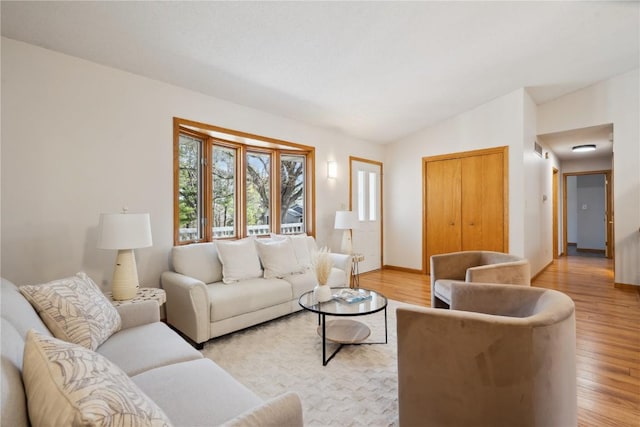 2135 Lake View Ridge Dr NE, Solon, IA 52333 - living room with lofted ceiling and light wood-type flooring