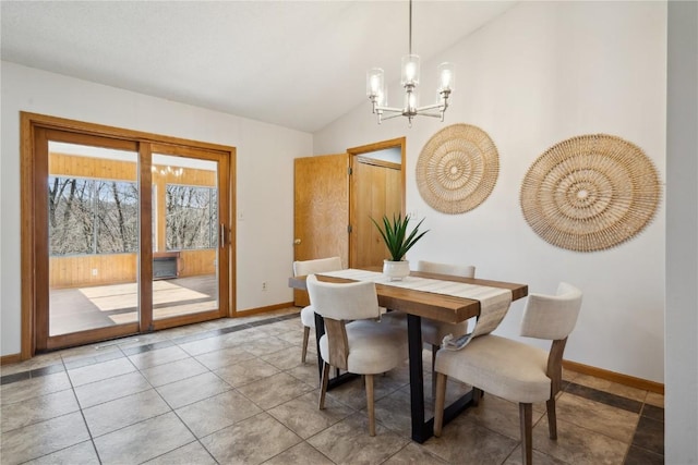 2135 Lake View Ridge Dr NE, Solon, IA 52333 - dining room featuring vaulted ceiling, a chandelier, and light tile patterned floors