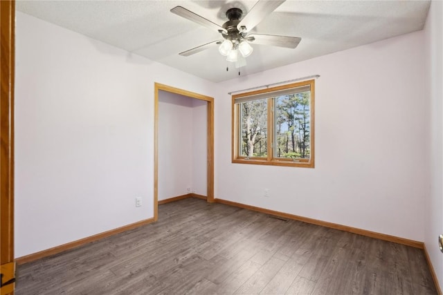 2135 Lake View Ridge Dr NE, Solon, IA 52333 - unfurnished room with wood finished floors and a ceiling fan