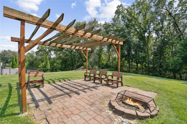 2135 Lake View Ridge Dr NE, Solon, IA 52333 - view of property's community featuring a fire pit, a patio, a pergola, and view of scattered trees