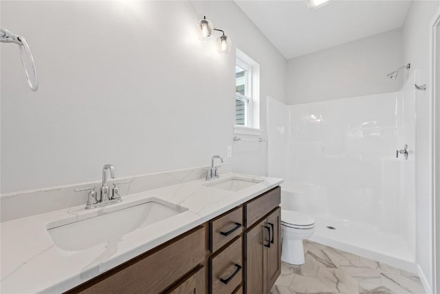 226 Mccarran Ave NE, Cedar Rapids, IA 52402 - full bathroom featuring a shower, marble finish floors, and double vanity