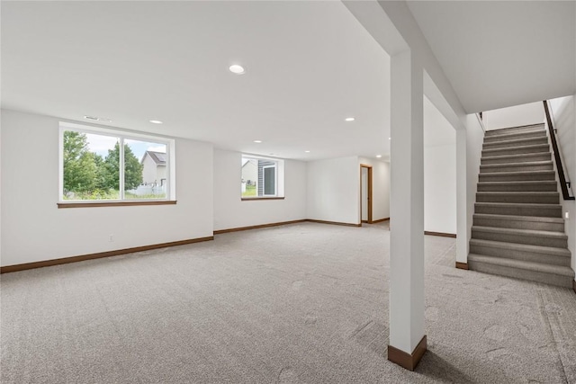 226 Mccarran Ave NE, Cedar Rapids, IA 52402 - basement featuring carpet floors, stairway, and recessed lighting