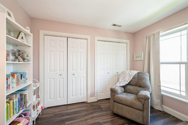2654 Mulberry Ct, Marion, IA 52302 - sitting room featuring dark wood finished floors and baseboards