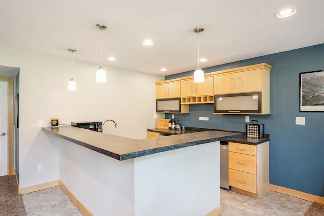2654 Mulberry Ct, Marion, IA 52302 - kitchen with light brown cabinetry, a peninsula, dark countertops, black microwave, and recessed lighting