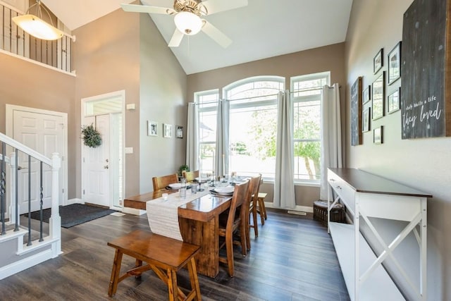 2654 Mulberry Ct, Marion, IA 52302 - dining room featuring stairs, a ceiling fan, dark wood-style floors, and high vaulted ceiling