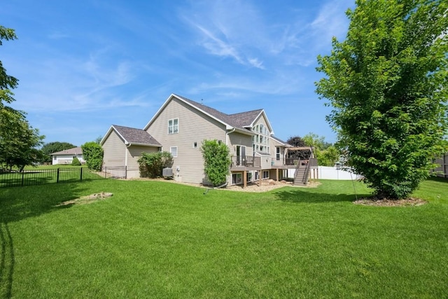 2654 Mulberry Ct, Marion, IA 52302 - rear view of house with stairs, a fenced backyard, and a wooden deck