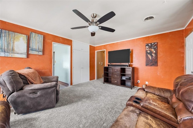 1140 31st St, Cedar Rapids, IA 52402 - carpeted living area with a ceiling fan