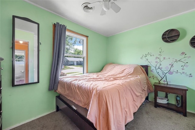 1140 31st St, Cedar Rapids, IA 52402 - bedroom with carpet flooring and a ceiling fan