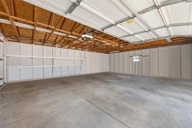 1140 31st St, Cedar Rapids, IA 52402 - garage featuring a garage door opener