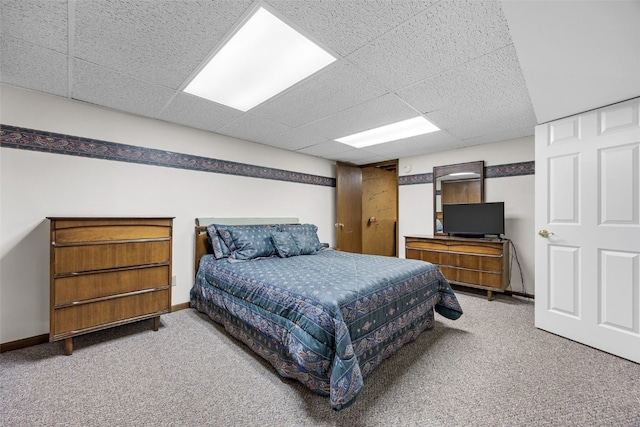 906 29th St NW, Cedar Rapids, IA 52405 - carpeted bedroom featuring a paneled ceiling