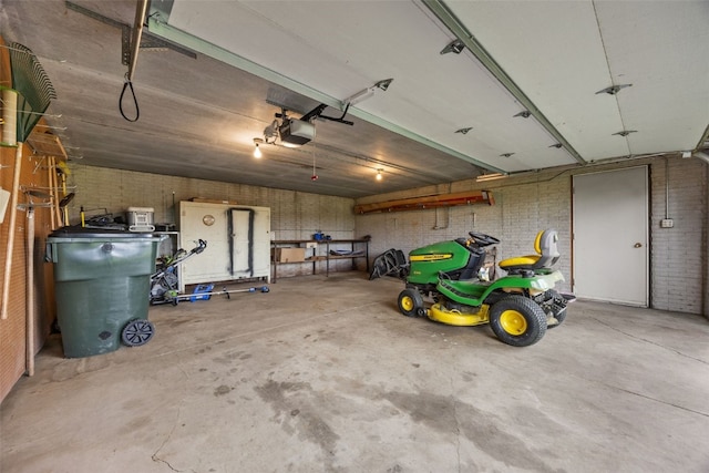 906 29th St NW, Cedar Rapids, IA 52405 - garage featuring a garage door opener