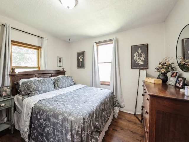 1 E Jefferson Ave S, Urbana, IA 52345 - bedroom with dark wood-type flooring