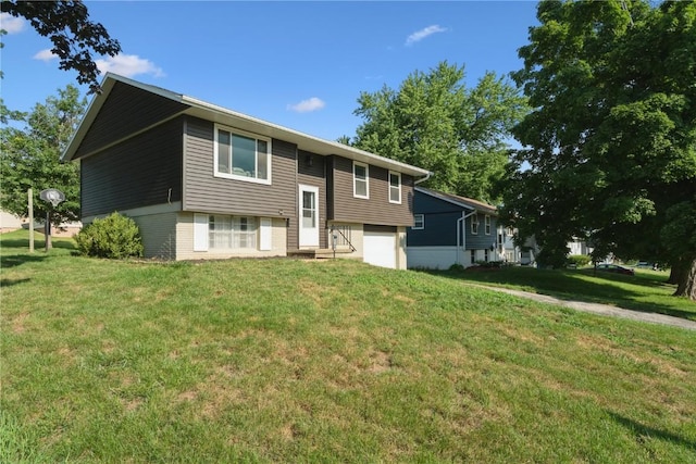 3140 Stratford Ln SW, Cedar Rapids, IA 52404 - bi-level home with an attached garage, a front yard, and entry steps