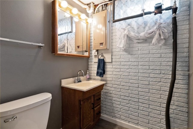 3140 Stratford Ln SW, Cedar Rapids, IA 52404 - bathroom with toilet and vanity