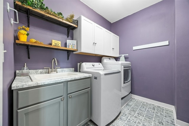 605 Alexis Ln, Marion, IA 52302 - washroom with independent washer and dryer and cabinet space