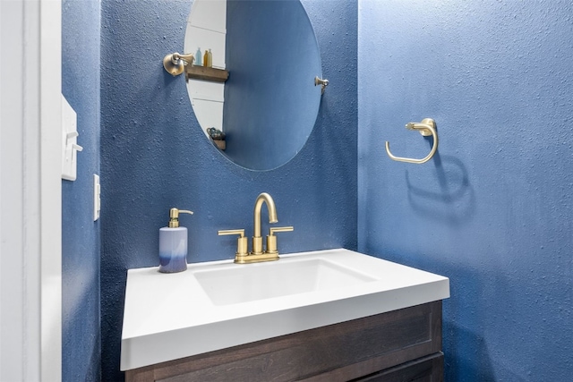 605 Alexis Ln, Marion, IA 52302 - bathroom with vanity and a textured wall