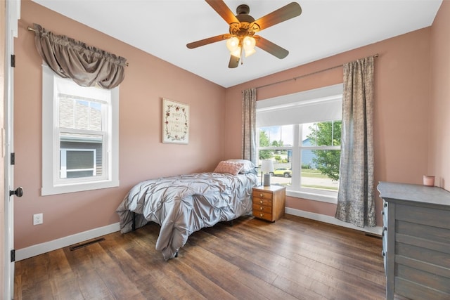 605 Alexis Ln, Marion, IA 52302 - bedroom featuring dark wood-type flooring and a ceiling fan