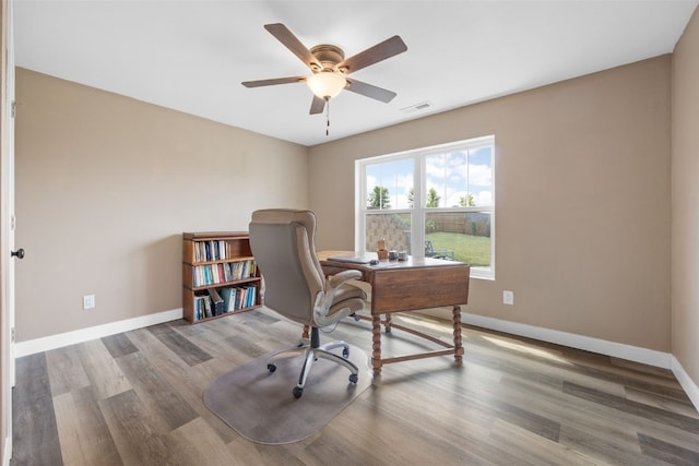605 Alexis Ln, Marion, IA 52302 - home office with a ceiling fan and wood finished floors