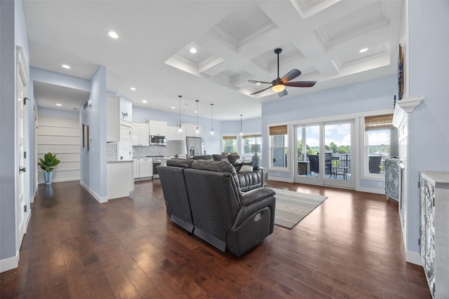 605 Alexis Ln, Marion, IA 52302 - living area featuring a ceiling fan, dark wood-type flooring, beam ceiling, recessed lighting, and coffered ceiling